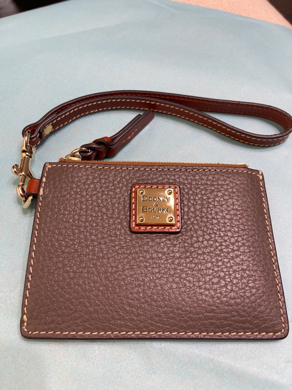 Dooney & Bourke Brown Pebbled Leather Wristlet with Gold Plaque